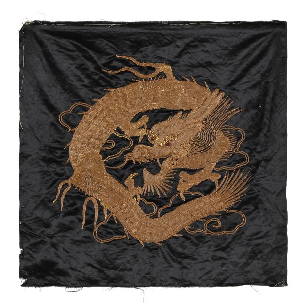a-japanese-embroidery-of-a-golden-dragon