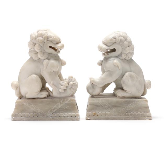 a-pair-of-carved-marble-foo-dogs
