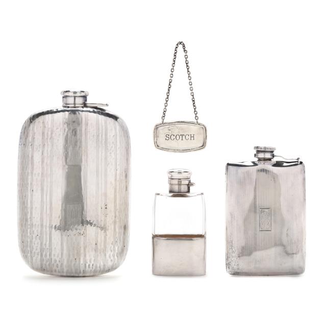 three-sterling-silver-flask-bottles-and-a-liquor-tag