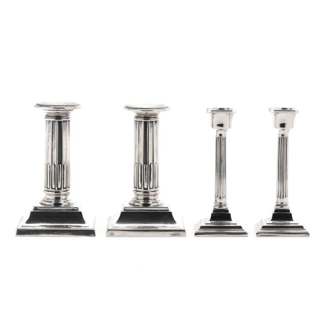 two-pairs-of-small-columnar-silver-plated-candlesticks