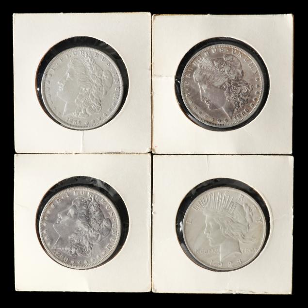 three-morgan-silver-dollars-and-one-peace-silver-dollar
