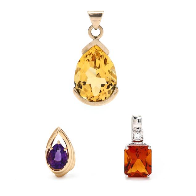 three-gold-and-quartz-pendants