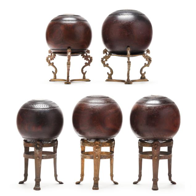 five-inlaid-wood-lawn-bowling-balls-with-brass-stands