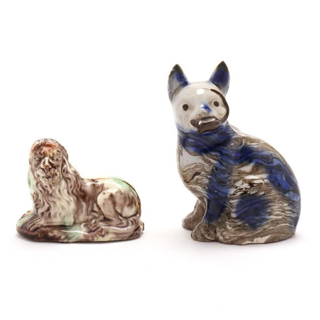 two-staffordshire-agateware-models-recumbent-lion-and-cat