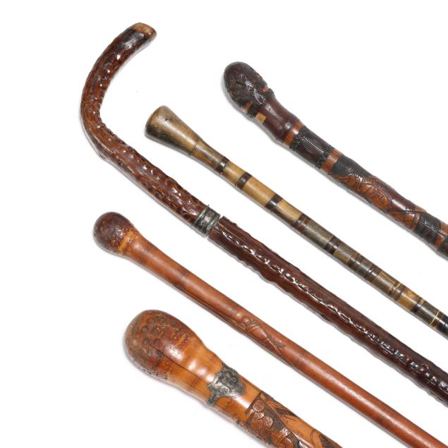 collection-of-five-exotic-carved-walking-sticks