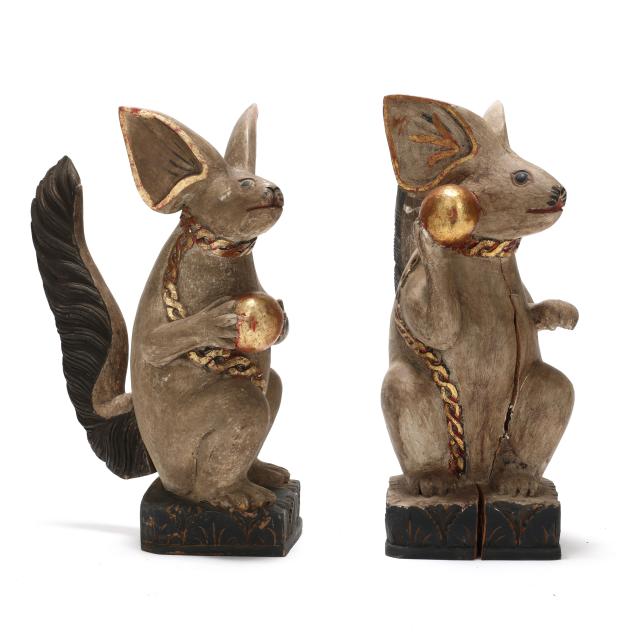 two-fanciful-southeast-asian-carved-and-painted-wooden-squirrels
