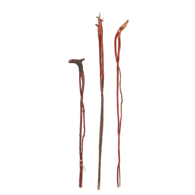 three-red-lacquer-and-gilt-chinese-staffs