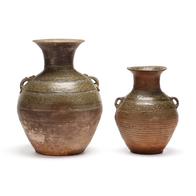 two-chinese-pottery-jars-with-handles-and-incised-decoration