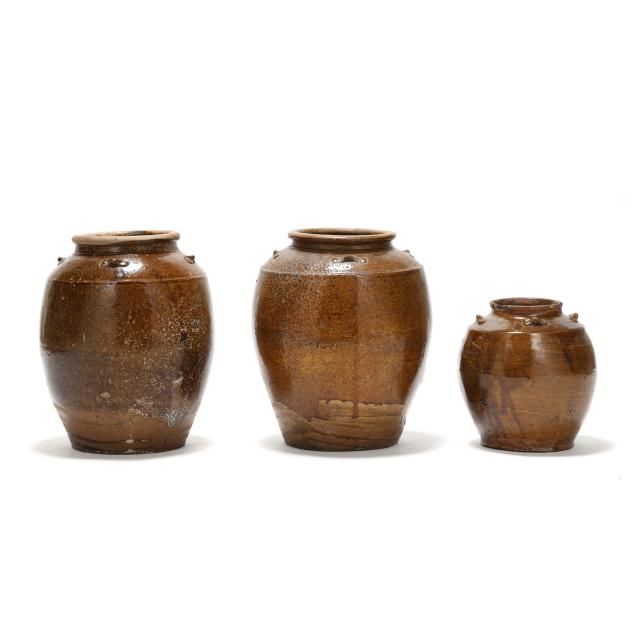 three-chinese-pottery-brown-glazed-jars-with-lug-handles