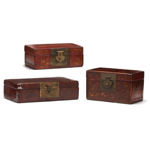 three-asian-red-lacquered-leather-boxes