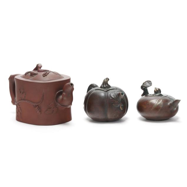 three-asian-teapots
