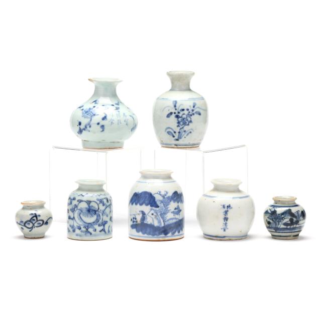 a-group-of-seven-asian-blue-and-white-porcelain-jars-and-jarlets
