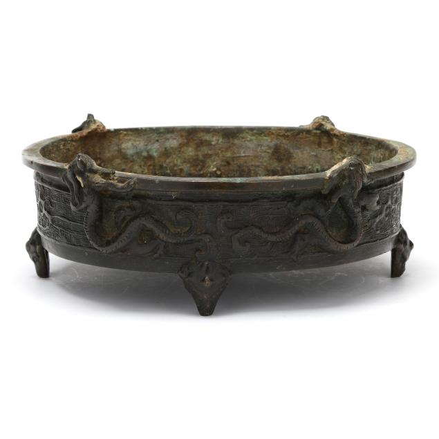 a-chinese-bronze-jardiniere-with-dragons