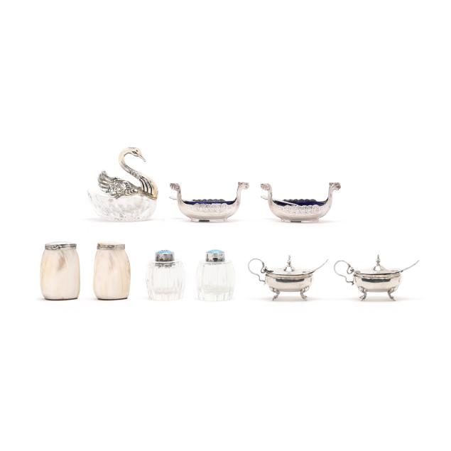 eclectic-assortment-of-silver-salt-serving-accessories