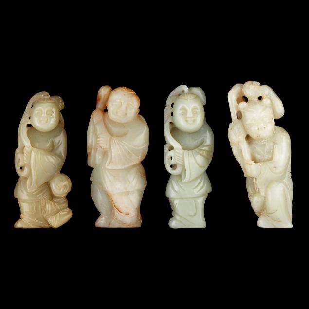 a-group-of-chinese-carved-figures