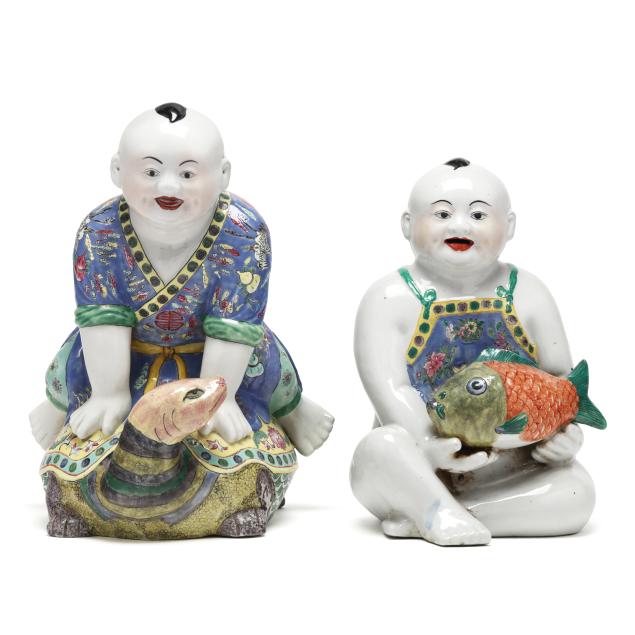 a-pair-of-chinese-republic-period-porcelain-figures-of-playing-boys