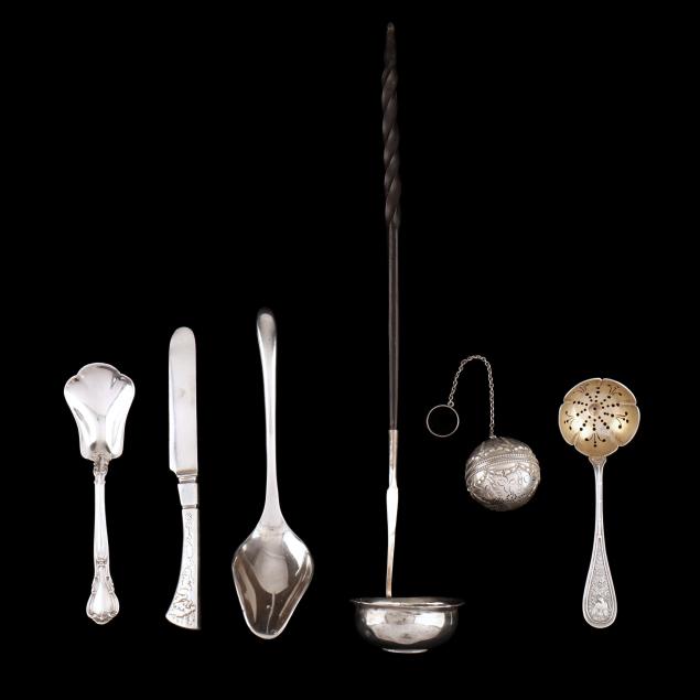 five-silver-serving-pieces-and-a-tea-ball