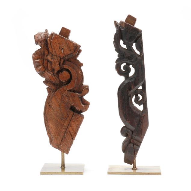 two-asian-carved-wood-architectural-elements-on-brass-stands