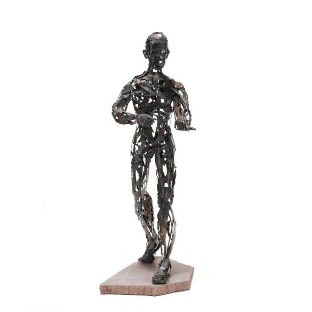 brutalist-figural-metal-sculpture-on-stone-stand