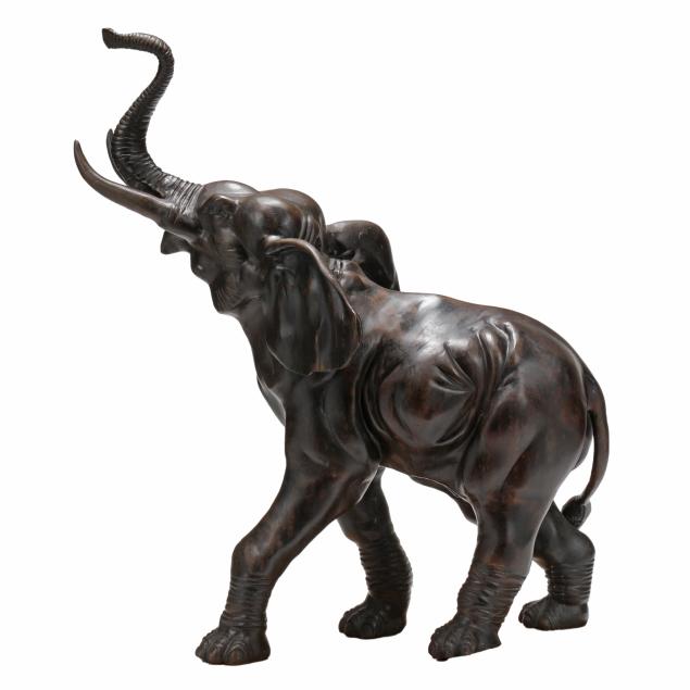 a-large-bronze-statue-of-an-elephant