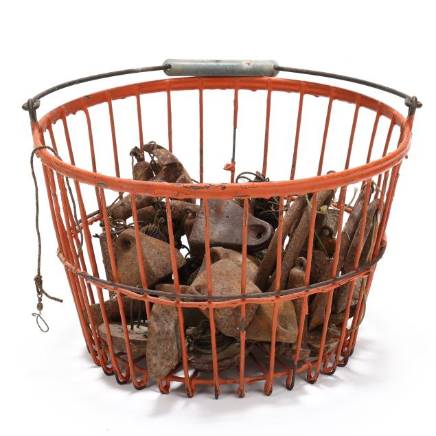 oyster-basket-full-of-early-iron-anchor-weights