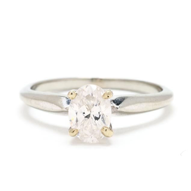 white-gold-and-oval-cut-diamond-solitaire-ring