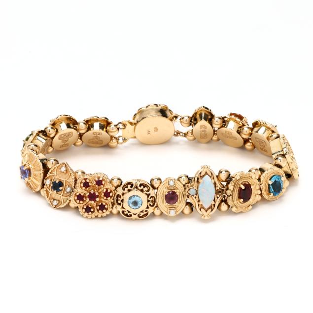 gold-and-gem-set-slide-charm-bracelet-richard-glatter