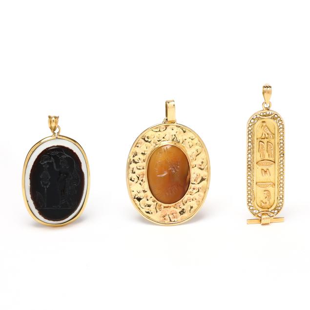 three-gold-antiquarian-motif-pendants