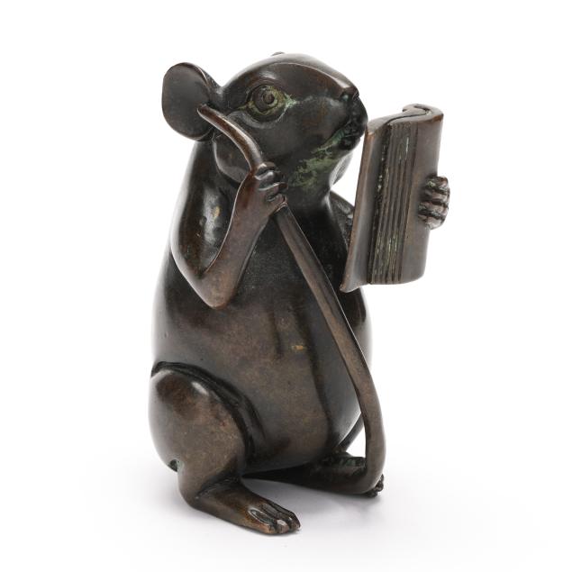 an-asian-bronze-mouse-reading-a-book