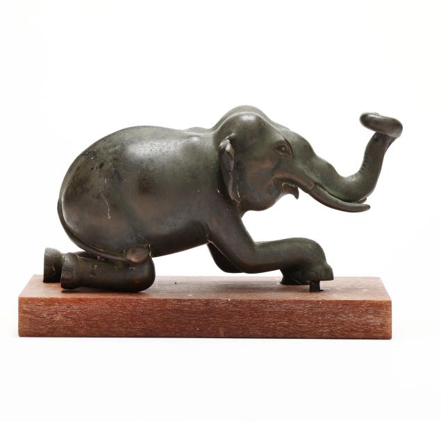an-asian-bronze-elephant-on-wood-stand