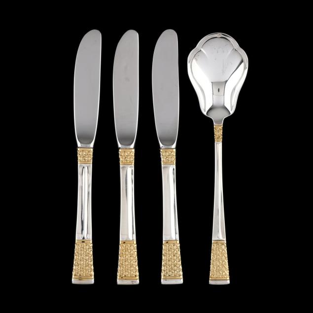 four-pieces-of-lunt-i-golden-columbine-i-sterling-silver-flatware