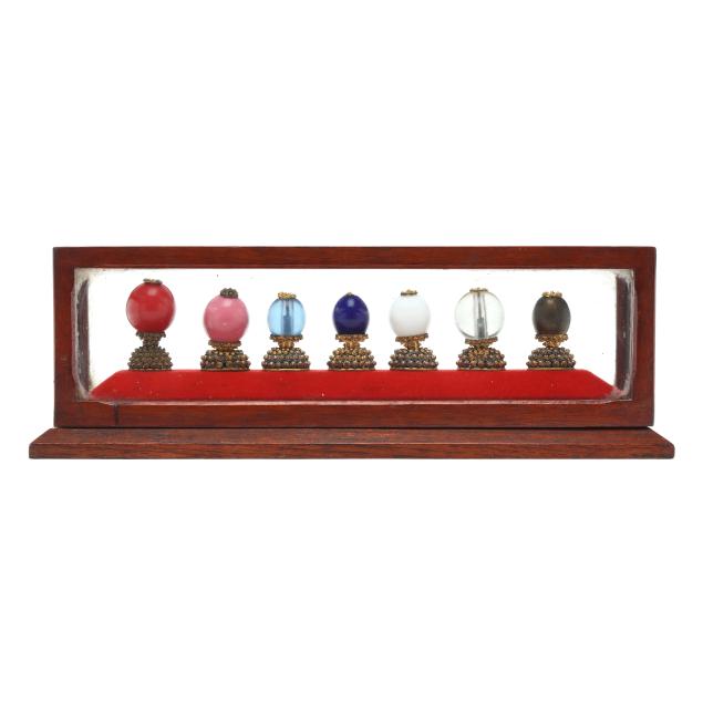 a-collection-of-seven-chinese-hat-insignias-with-presentation-box