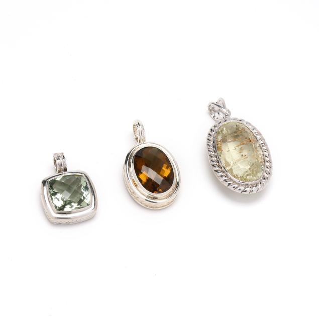 three-silver-and-gem-set-pendants