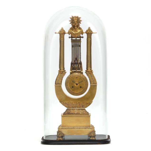 charles-x-gilt-bronze-lyre-swinger-mantel-clock-in-glass-dome