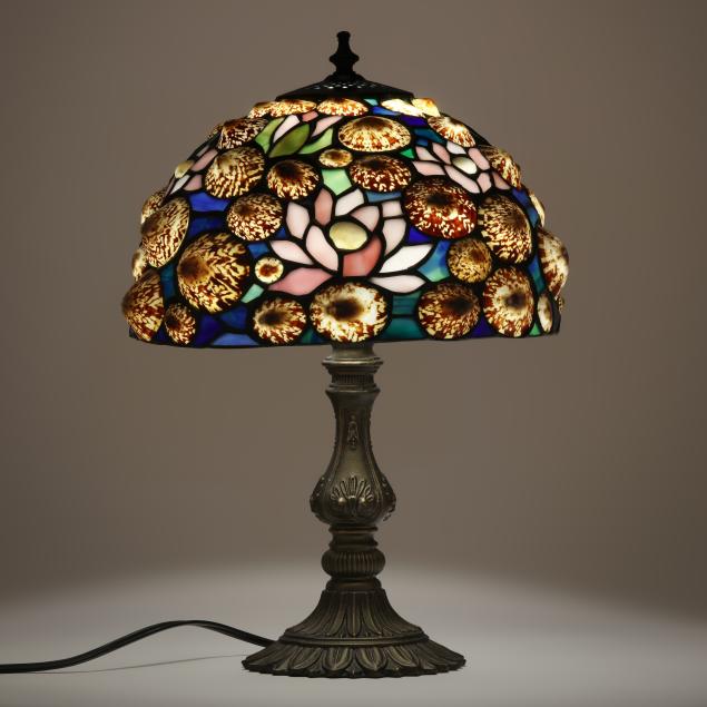 cast-metal-table-lamp-with-stained-glass-and-shell-lamp-shade