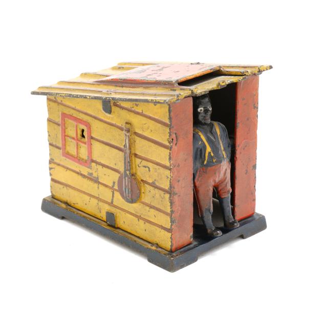 j-e-stevens-co-man-in-cabin-mechanical-coin-bank