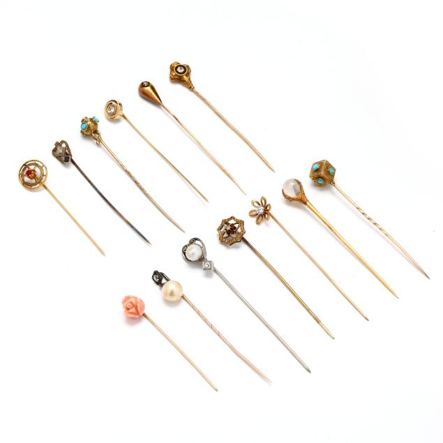 group-of-gold-and-gem-set-stick-pins