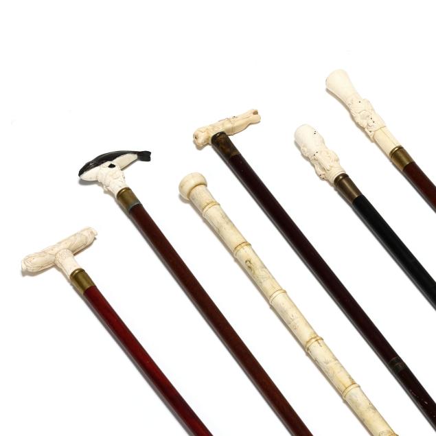 a-collection-of-six-carved-bone-and-horn-canes
