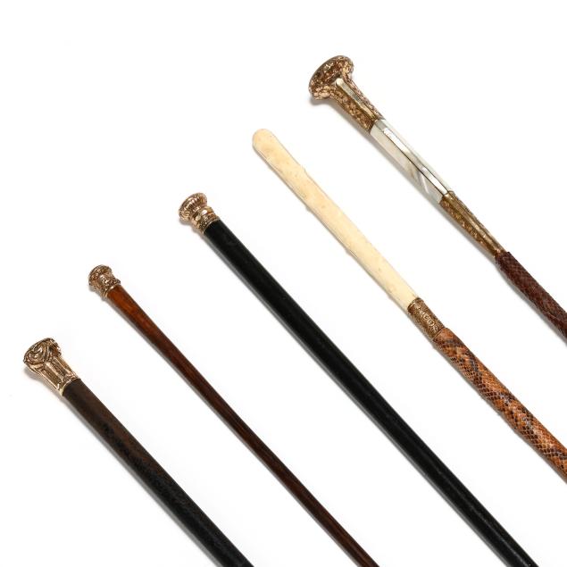 five-walking-sticks-with-gold-filled-mounts