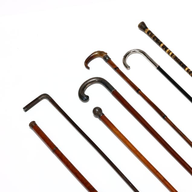 collection-of-seven-canes-including-hidden-flask-form