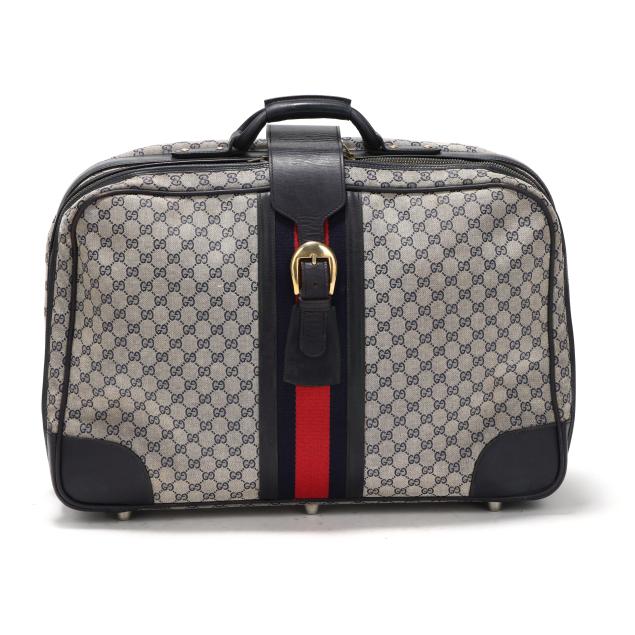 vintage-canvas-and-leather-suitcase-gucci