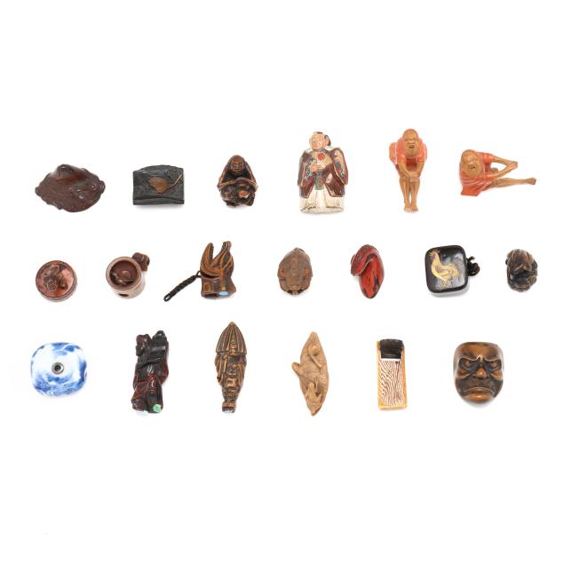 a-large-group-of-nineteen-japanese-netsuke-and-carvings