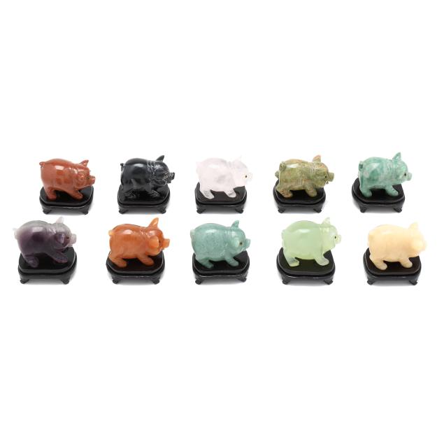 a-set-of-asian-hardstone-pigs-in-presentation-case