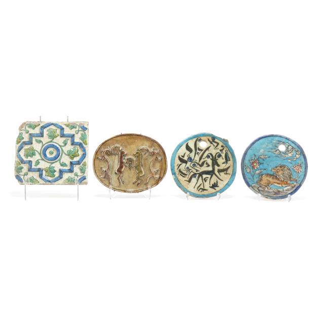 a-group-of-four-ceramic-persian-tiles