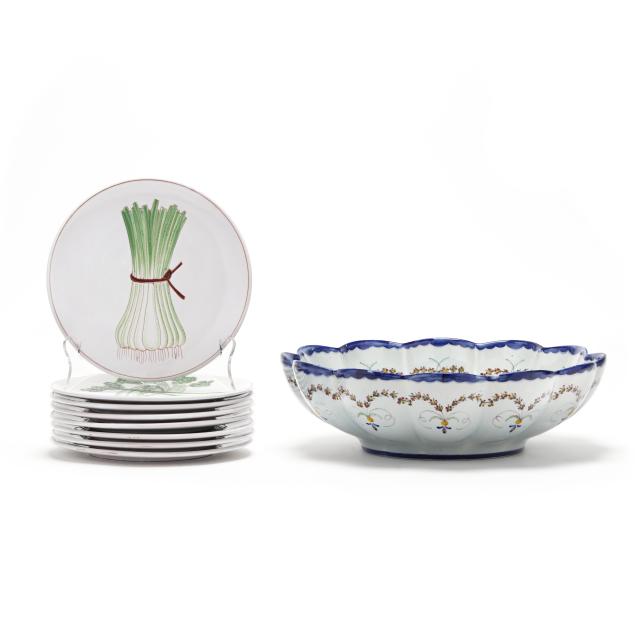 eight-faience-vegetable-plates-and-a-centerpiece-bowl