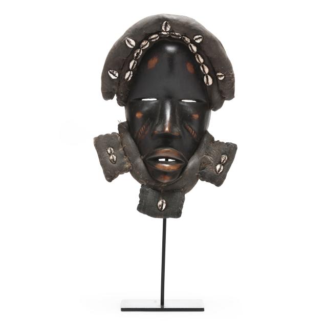 a-dan-poro-society-mask-with-cowrie-shells