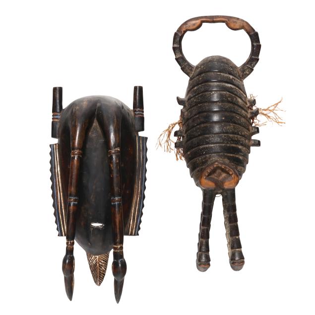 two-ivorian-carved-and-painted-wood-animal-form-masks