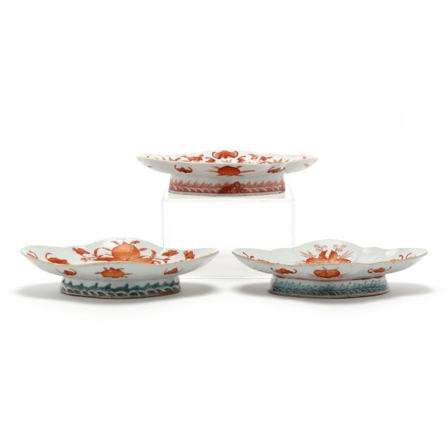 a-group-of-three-chinese-porcelain-lozenge-dishes-with-auspicious-symbols