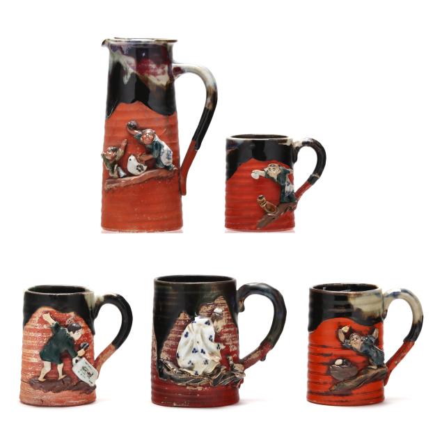 a-group-of-five-pottery-mugs-and-pitcher-by-sumida-gawa