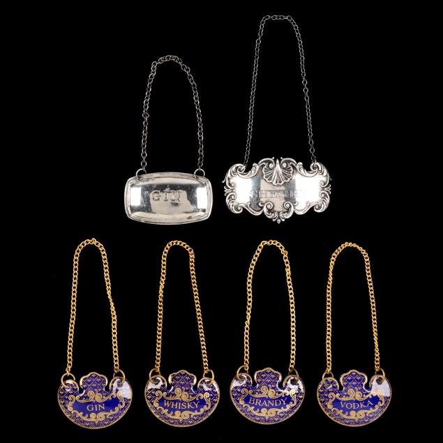 a-group-of-silver-and-halcyon-days-enamel-bottle-tags